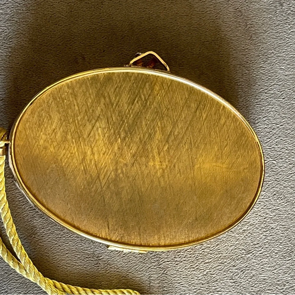 Vintage Italian Gold Metal Embossed Oval Evening Clutch with Tassel Wristlet
